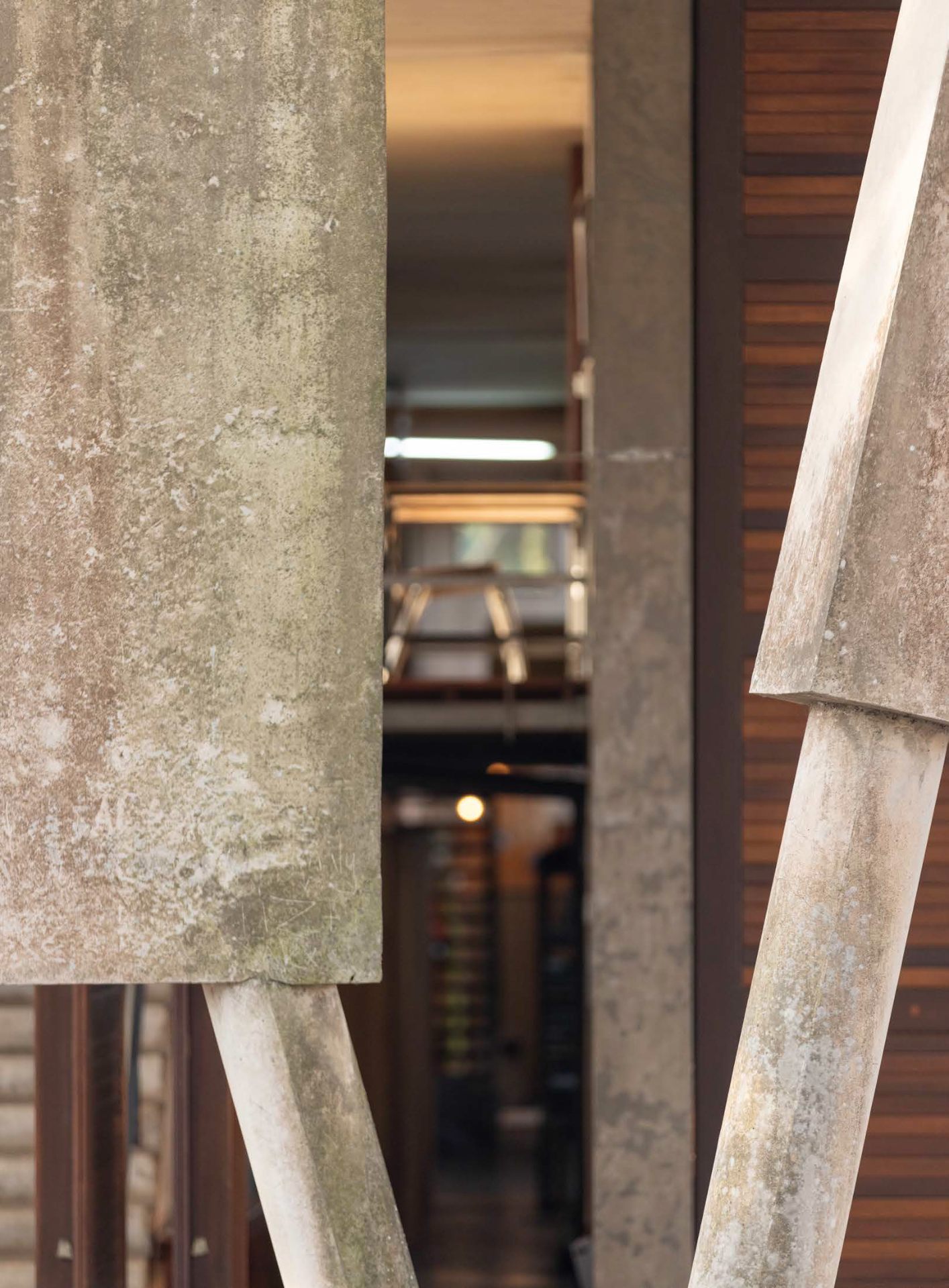 Concrete columns framing a view through the Bellevue Campus